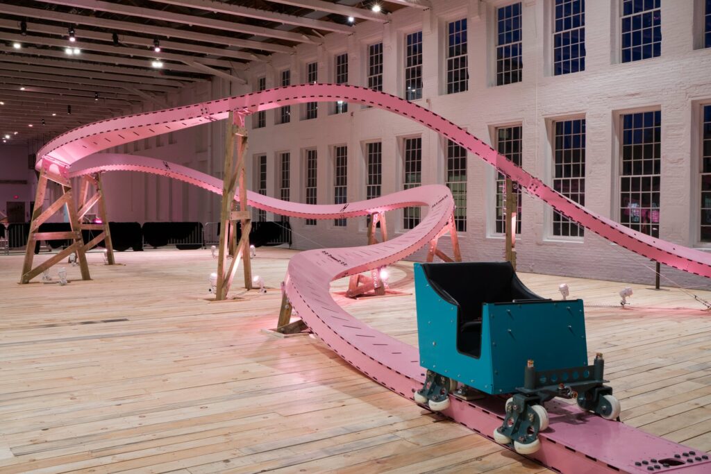 pink bublegum rollercoaster and a blue wagon